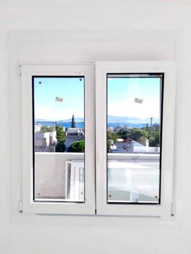 Παράθυρο ανοιγόμενο, δίφυλλο, σειράς Europa 5000 με ρολό και σήτα