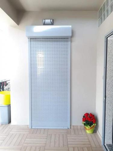 Πόρτα αλουμινίου συρόμενη μονόφυλλη, με ηλεκτρικό ρολό, σειρά Europa 6000